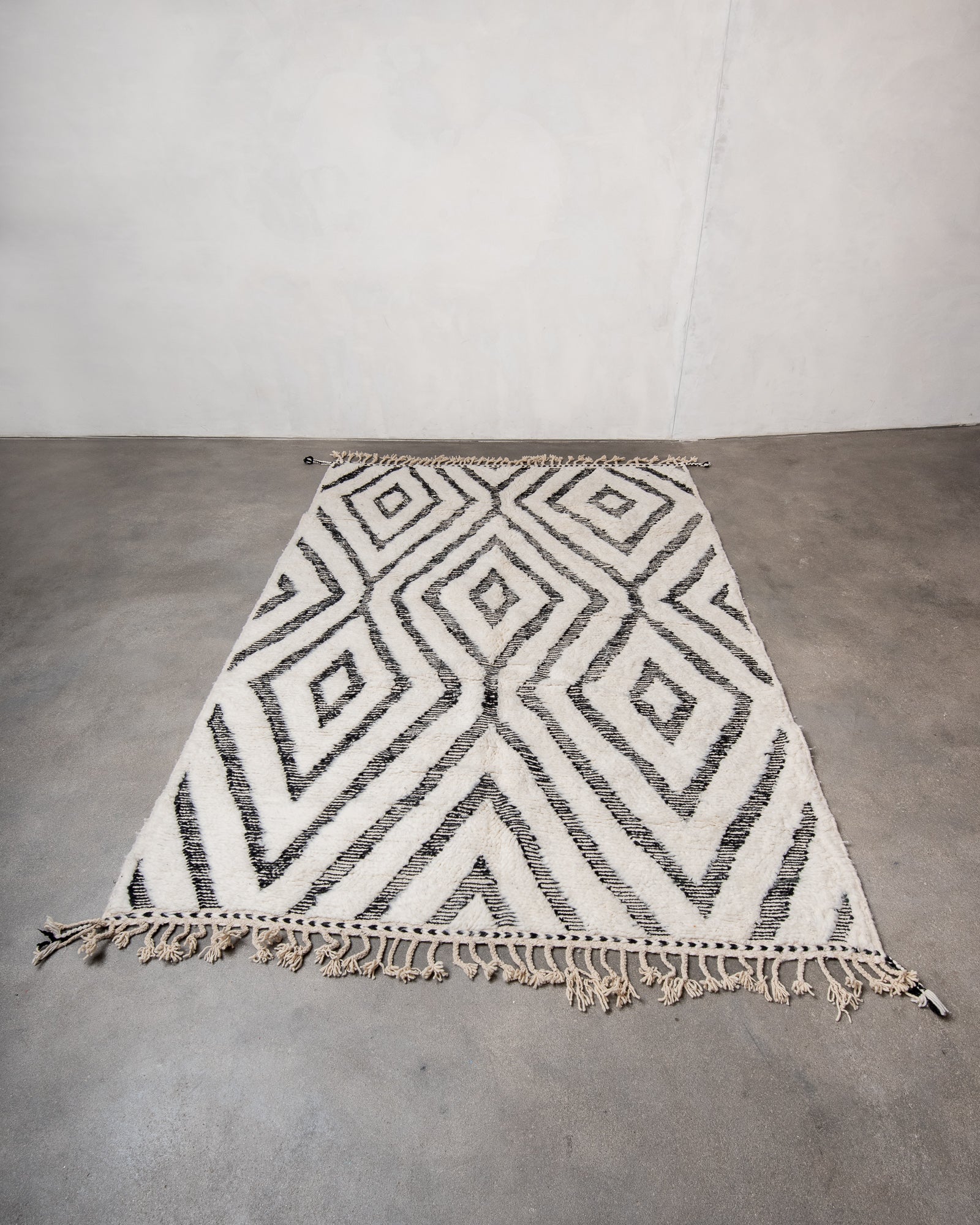 Modern, designer, handcrafted Berber rug from Morocco. Beniourain carpet with beautiful colours and patterns and fluffy wool texture.